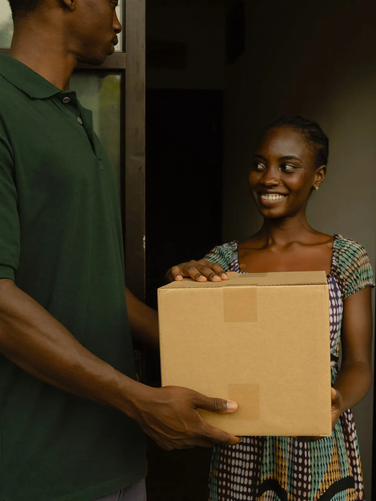 A parcel handed to a customer at her door